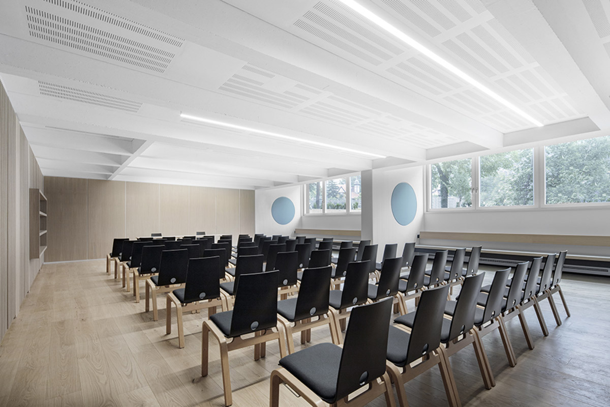 MoDusArchitects renovates Cusanus Academy with subtle elements in Bolzano, Italy