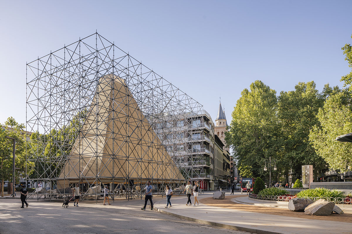 Aire Pavilion wrapped by giant scaffolding represents 