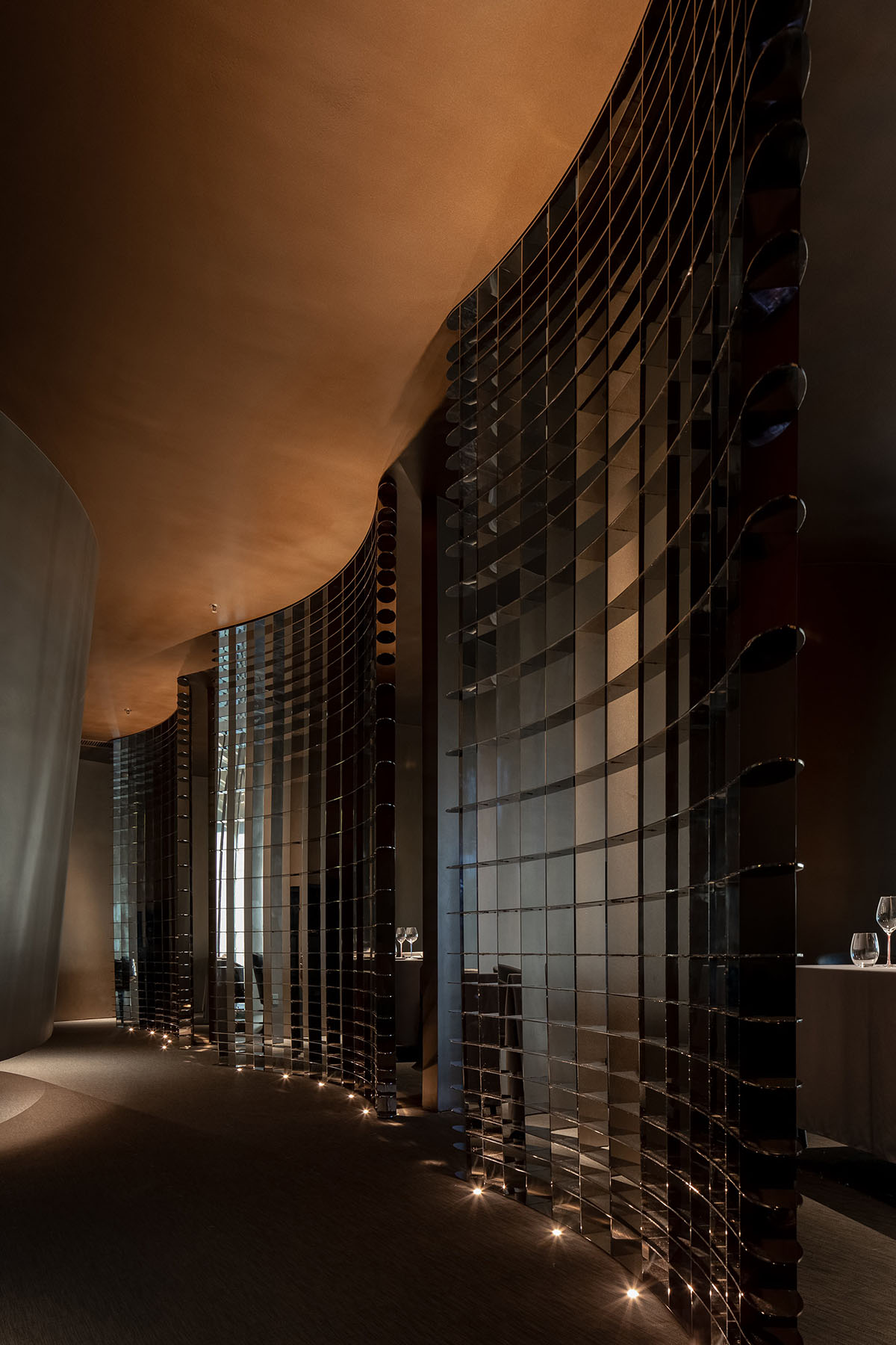 AD ARCHITECTURE designs restaurant with dark and cozy interiors in Shenzhen