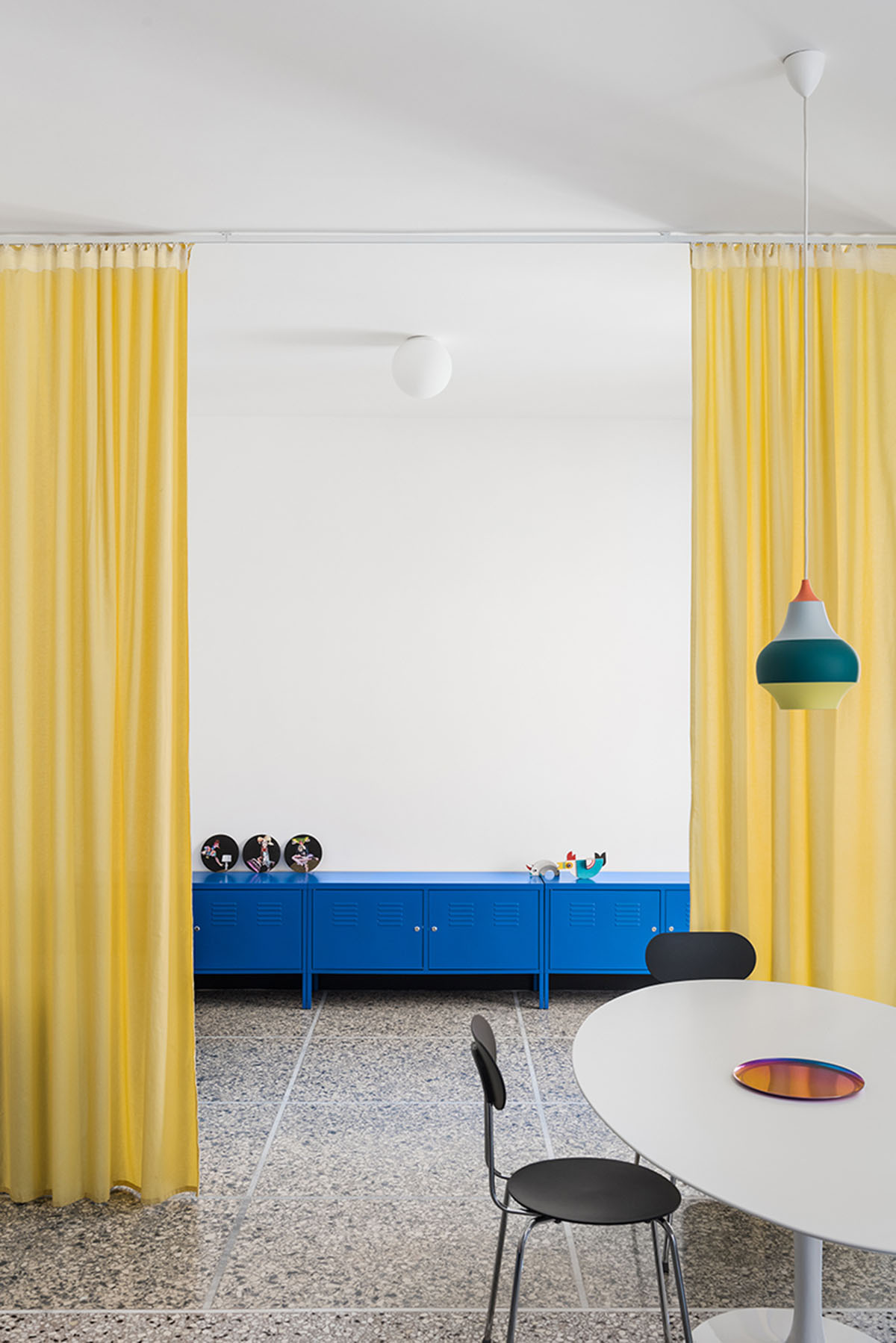 La Macchina Studio revives old apartment with theatrical and colorful interiors in Rome