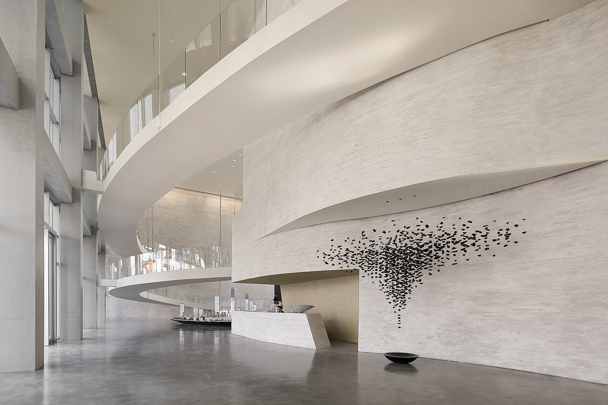 Waterfrom Design's art space features flowing walls to create