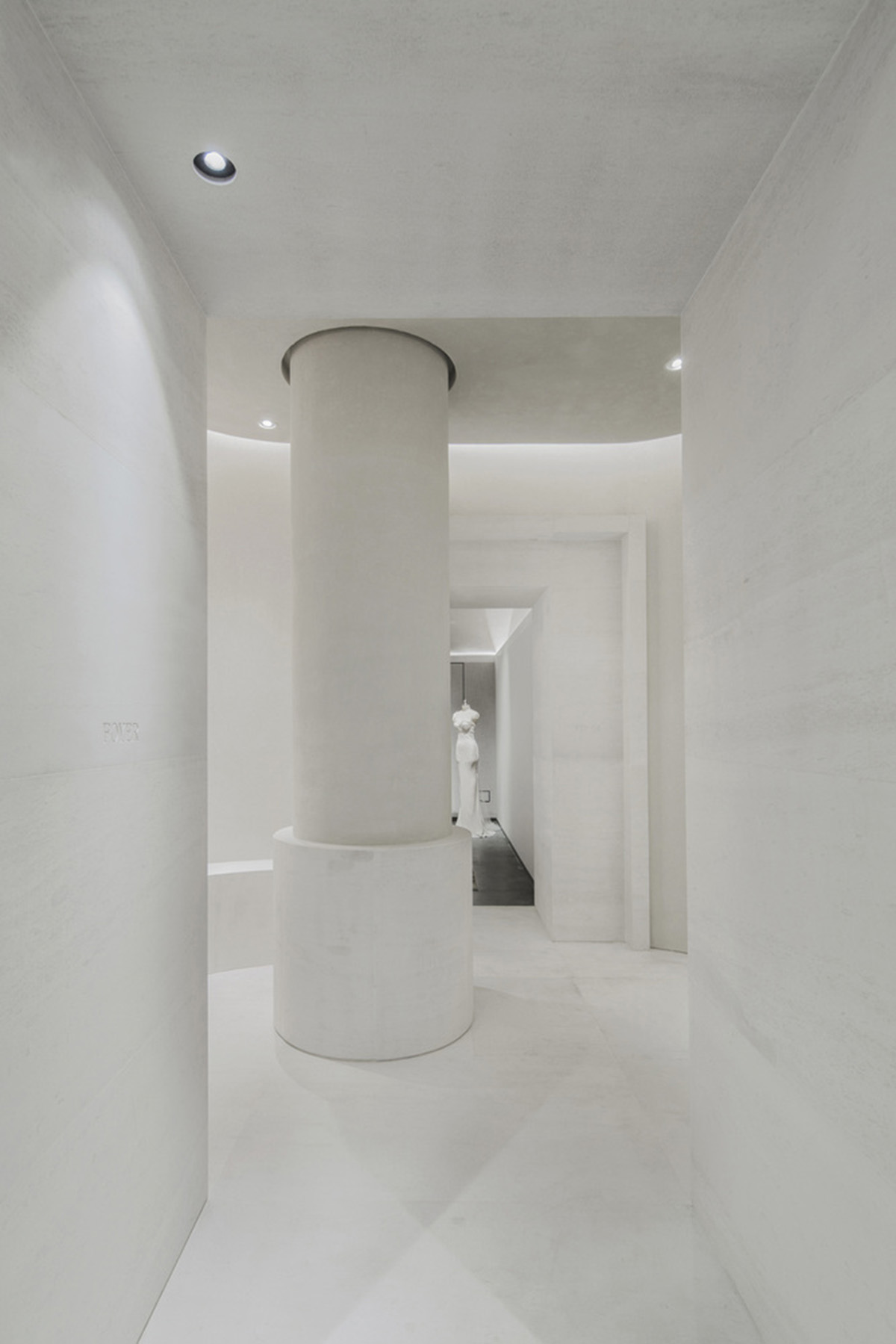 Atelier tao+c combines bright interior with black-framed showcase rooms for flagship store in China