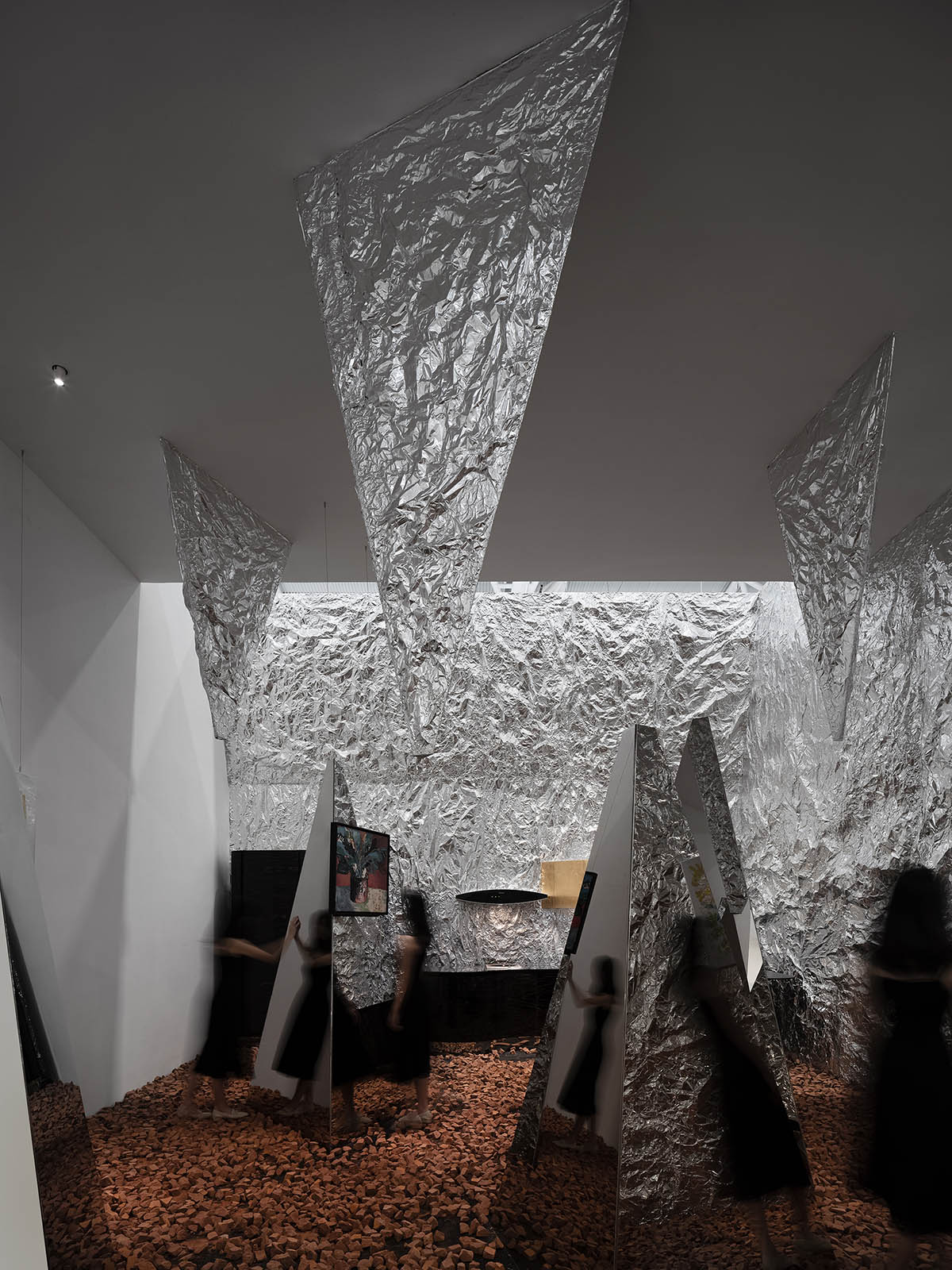 AD ARCHITECTURE creates metallic interiors for Mirror Gallery exhibition space in Shenzhen