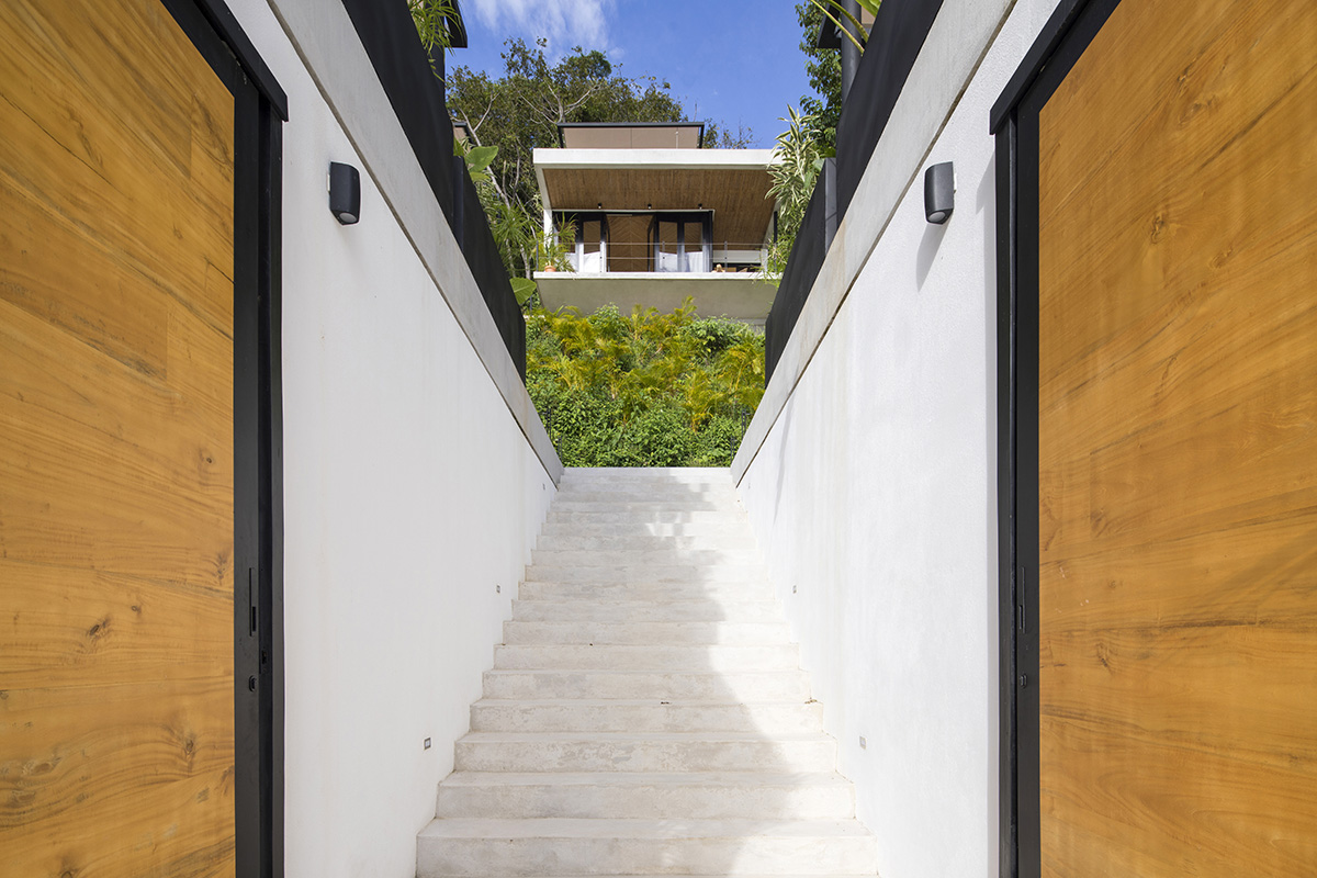 Studio Saxe completes terraced boutique hotel on a steep hillside in Costa Rica