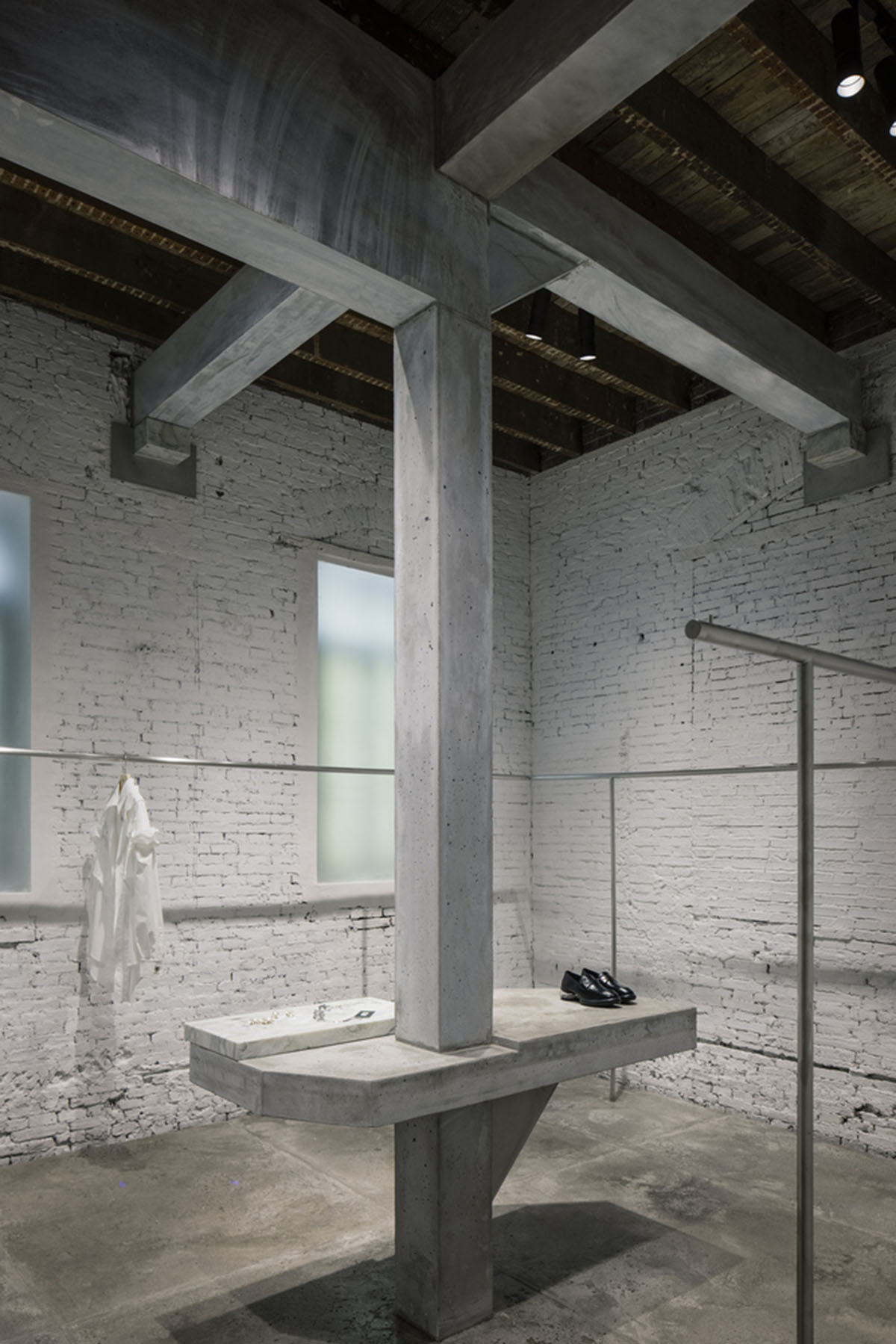 Atelier tao+c converts old residence into a store with free standing elements in Shanghai 