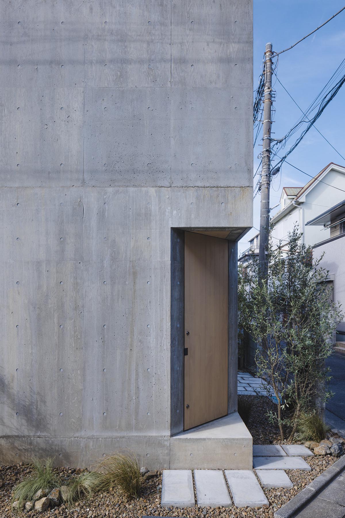 IGArchitects completes Check Patterned House on a corner site in Japan