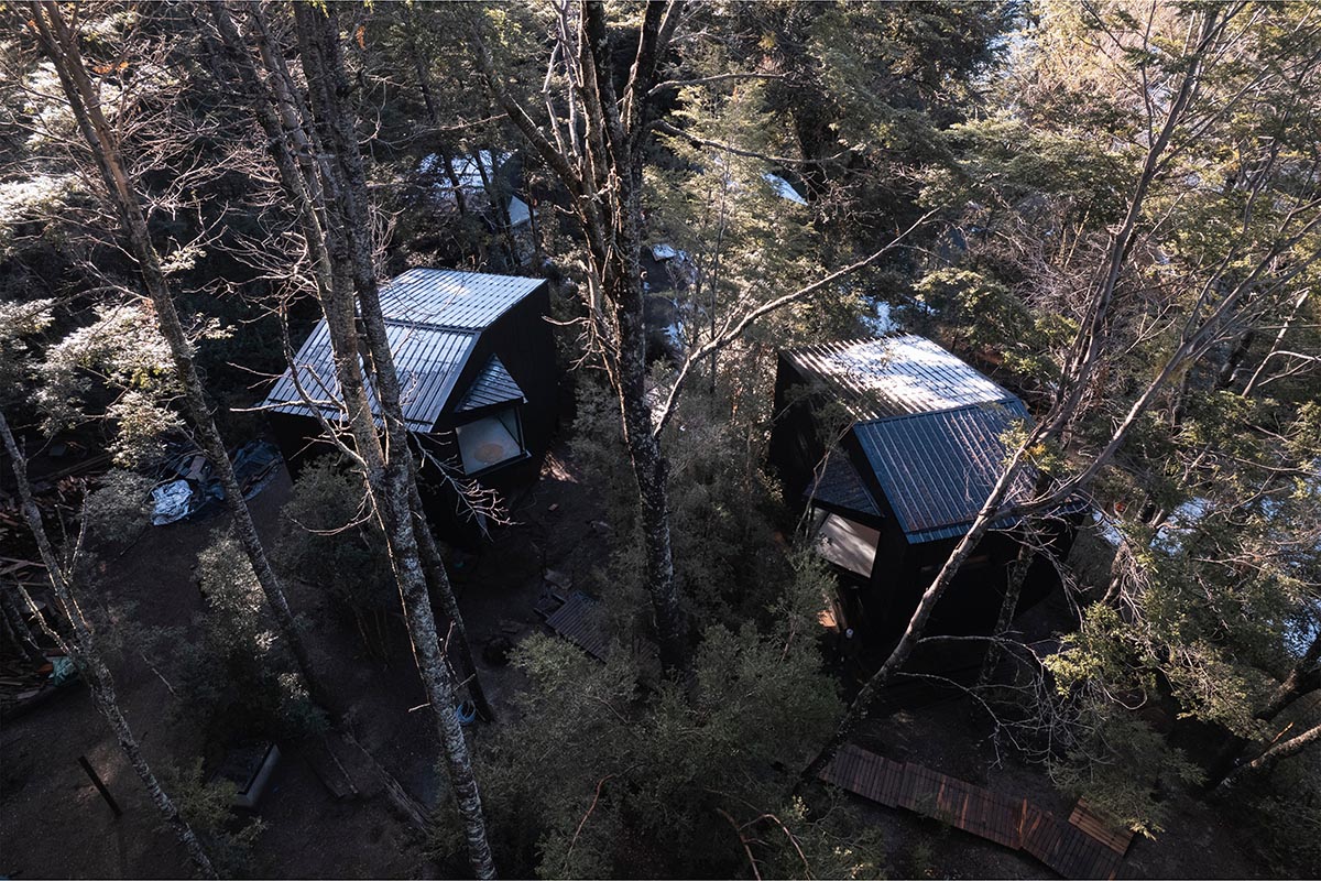 Argentinean guest cabins are envisioned with a rugged, rocky morphology clad in eucalyptus wood