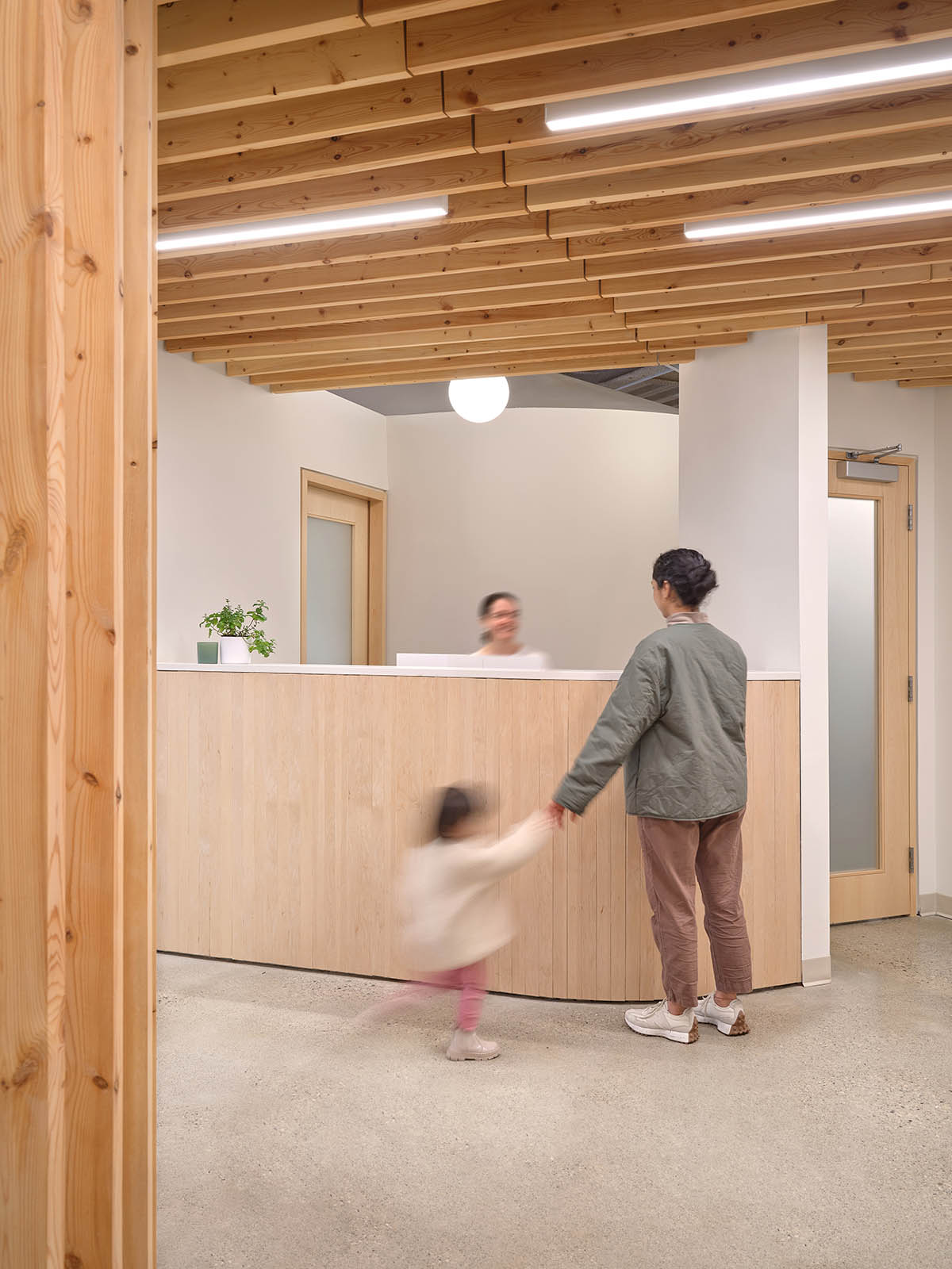 Medical clinic designed by Fonseka Studio creates a light, warm, and uplifting atmosphere in Ontario