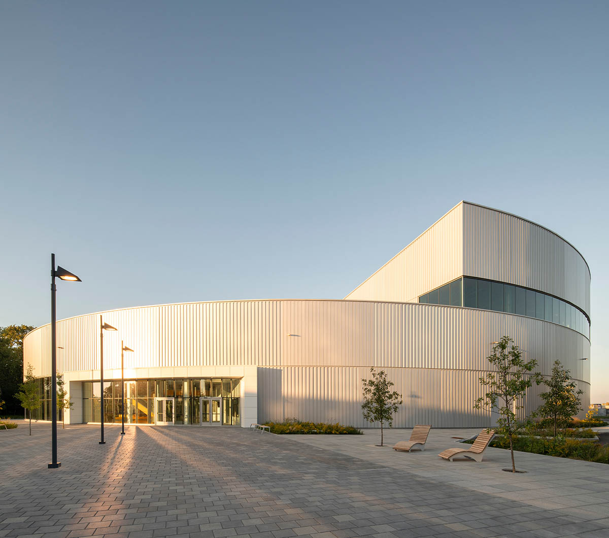 Sid Lee Architecture completes cylindrical aquatic complex in Laval, Canada
