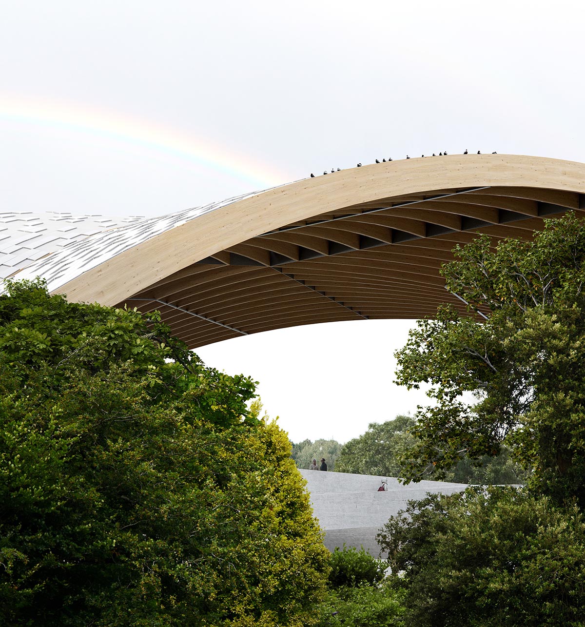 Revery Architecture covers the PNE Amphitheatre with a massive starburst timber roof in Vancouver 