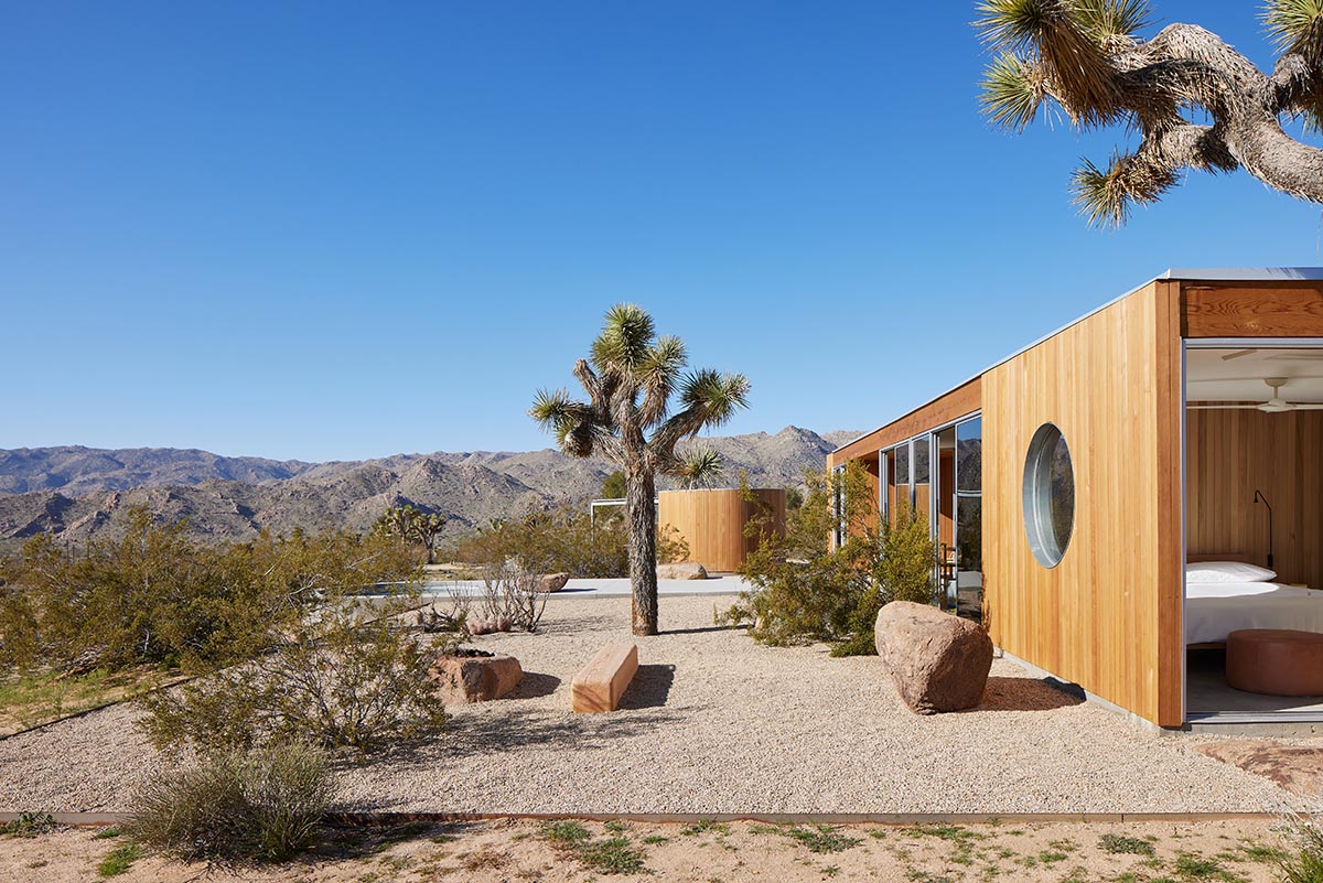 Industry of All Nations built a wooden pavilion in the rugged natural landscape of the Mojave Desert