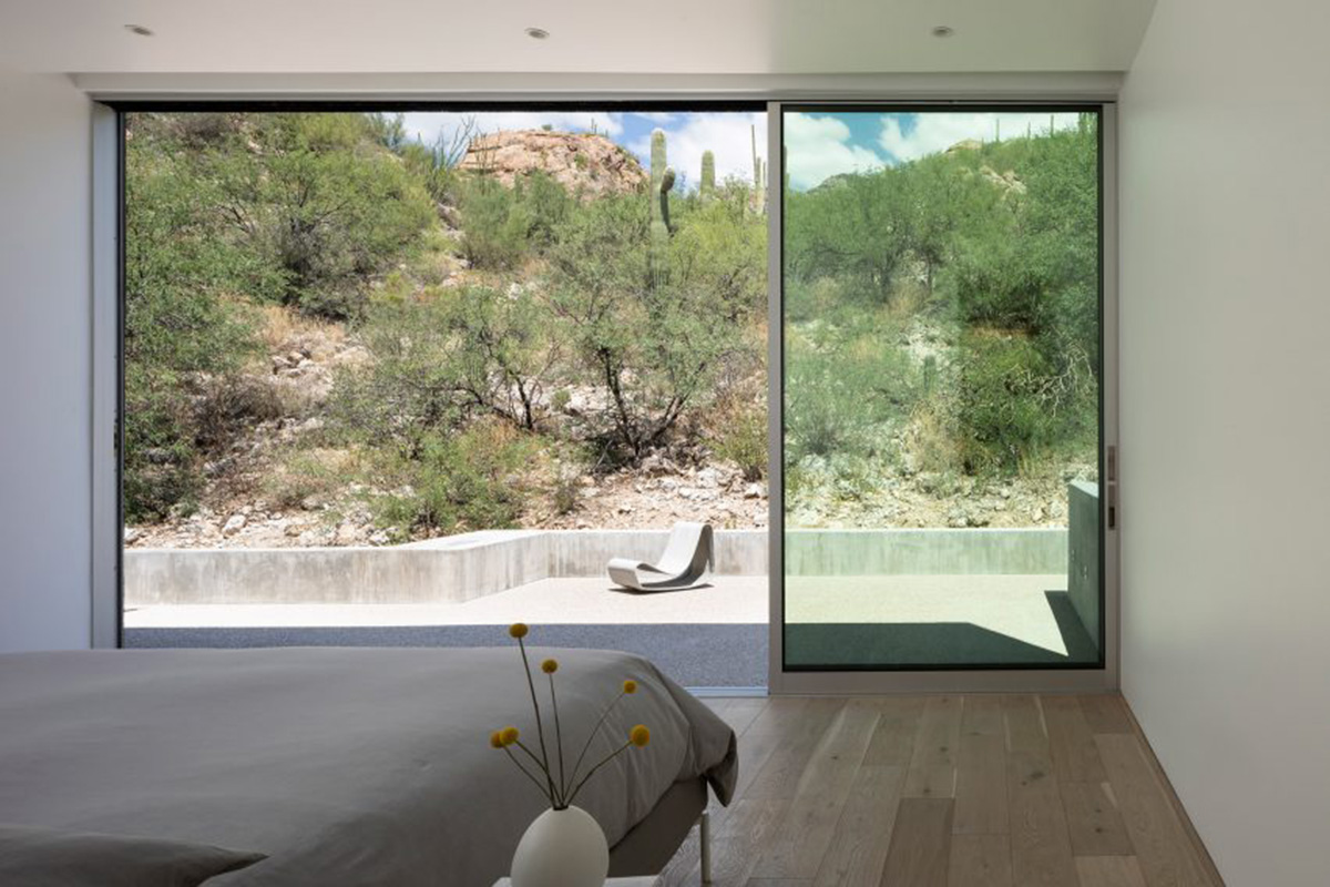 HK Associates Inc frames desert oasis with Ventana House featuring geometric protrudings in Tucson
