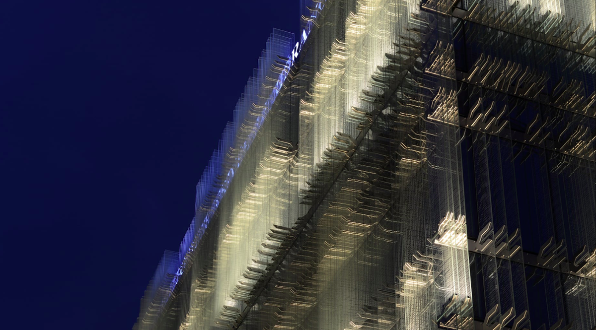 Giovanni Vaccarini wraps SPG Headquarters with countless glass fins, placed perpendicular to facade