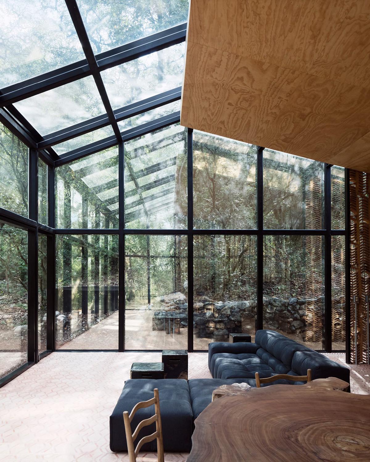 Tatiana Bilbao completes holiday dwelling that reflects its surrounding landscape with mirrored skin