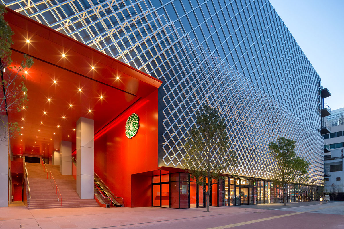 Kengo Kuma revives Japan's historic theatre with black square tiles creating motif on the façade