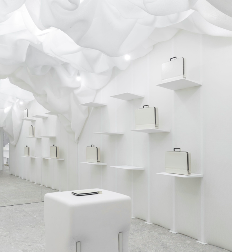 Snarkitecture created pop-up clouded-fabric for Valextra’s store in Milan