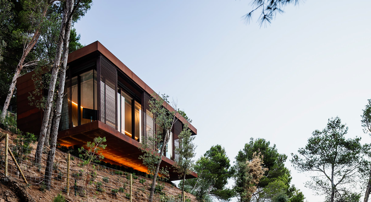 This Is Arquitectura completes corten steel Guest Pavilion in the middle of forest in Spain