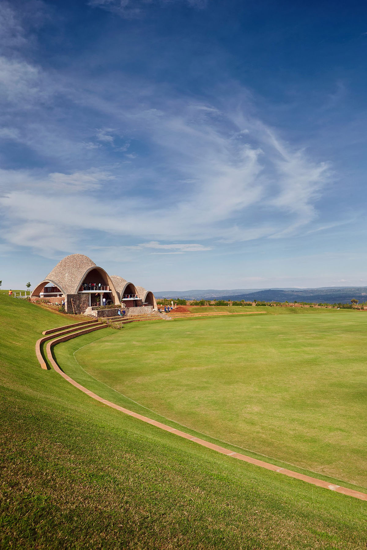 Light Earth Designs' parabolic Cricket Stadium addresses to cherished hilly topography of Rwanda