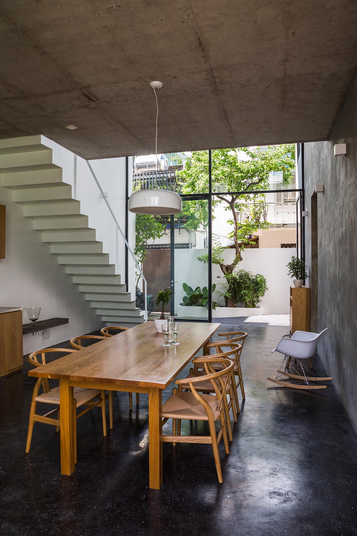 Sanuki Daisuke Architects' multifaceted concrete house features more open spaces in Vietnam