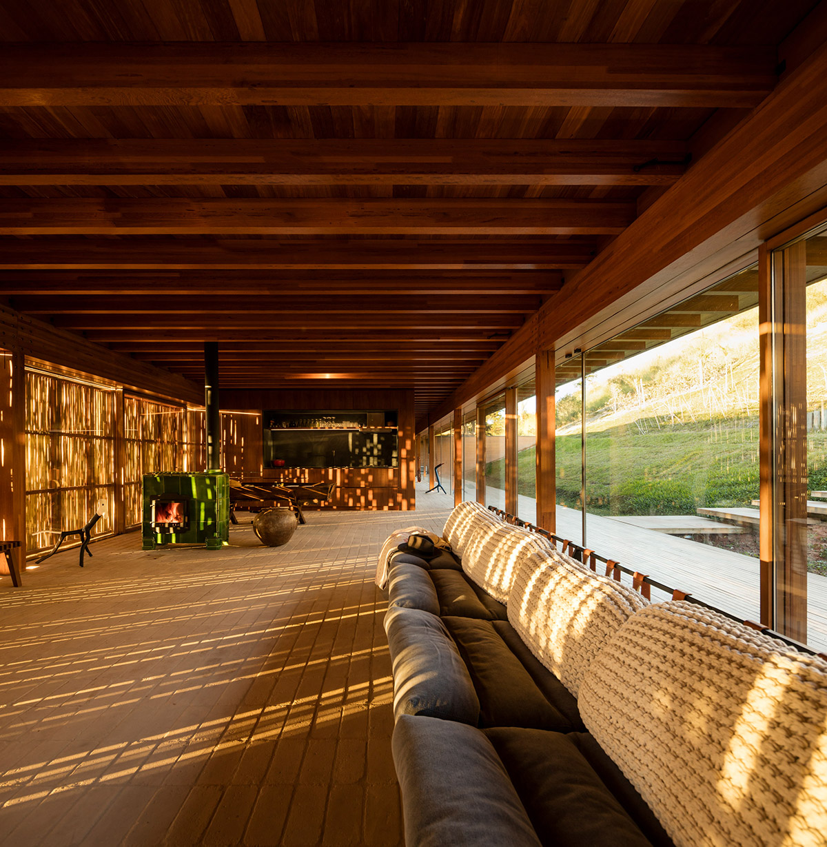 Narrow wooden Catu&ccedil;aba House by Studio MK27 produces its own energy on a valley of S&atilde;o Paulo