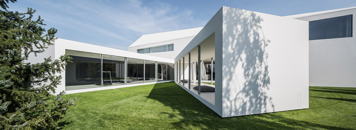 Movements of sun define the form of this protruding house designed by KWK Promes in Poland