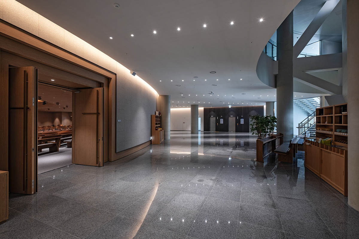 Seoinn Design Group built a curvaceous church with fluid towers challenging to traditional churches