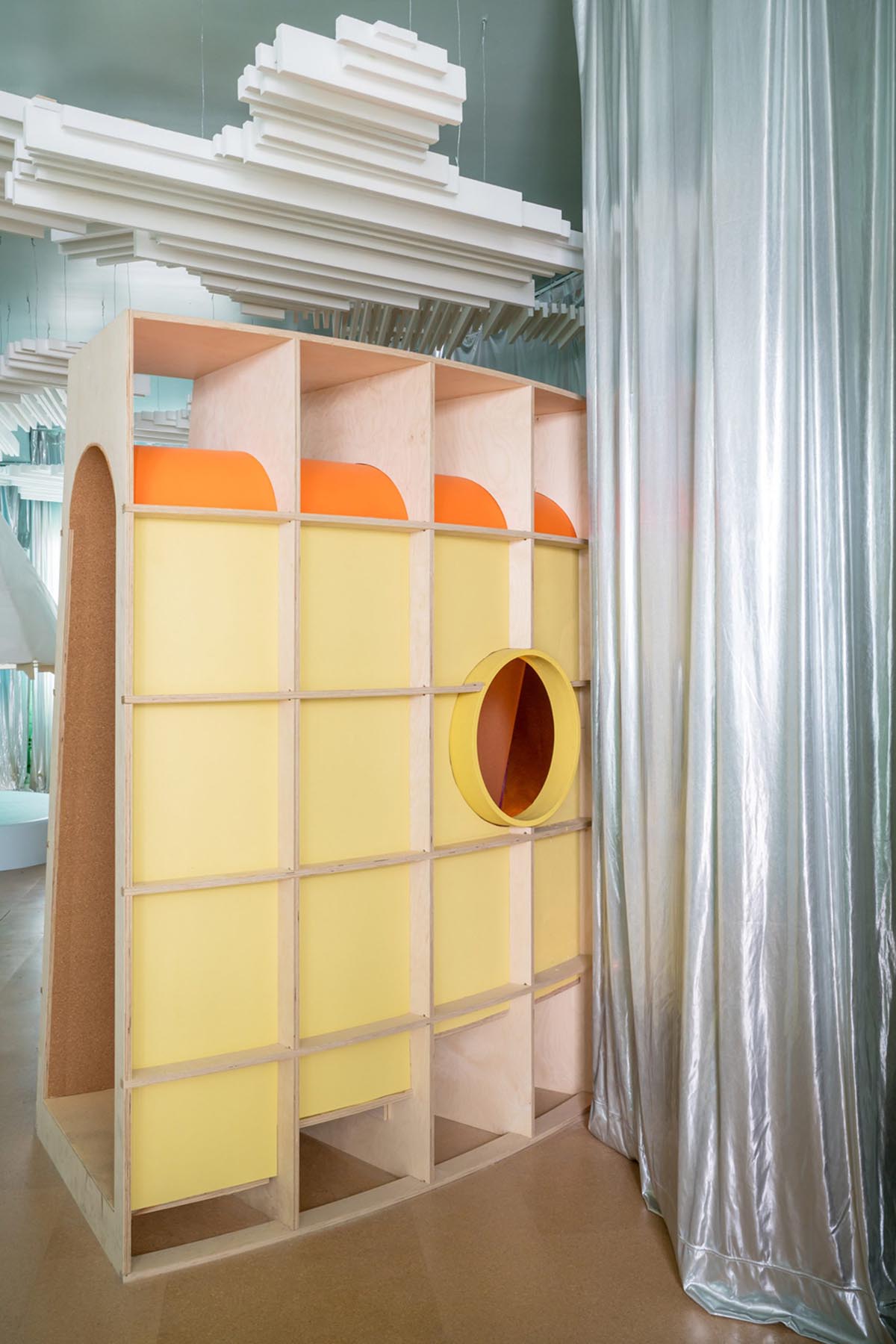 Architensions uses abstract elements of nature for children's playground made of plywood structures