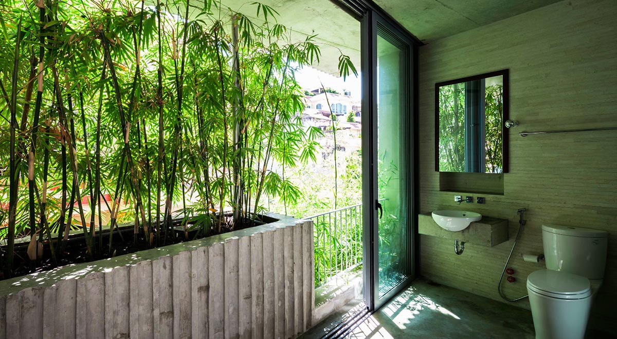 VTN Architects designs pop-up green facade for Bamboo House in a narrow site of Vietnam
