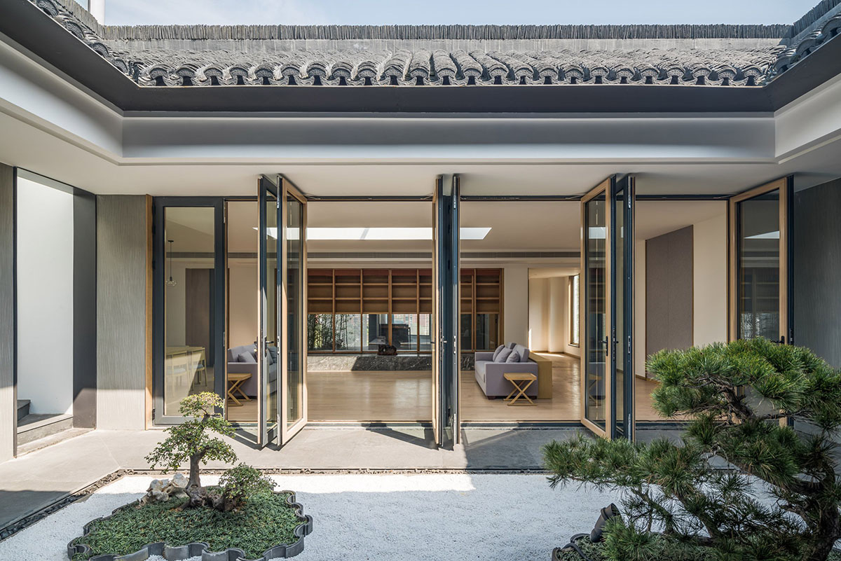 An Art Museum veiled by pleated aluminium panels creates mysticism between inside and outside