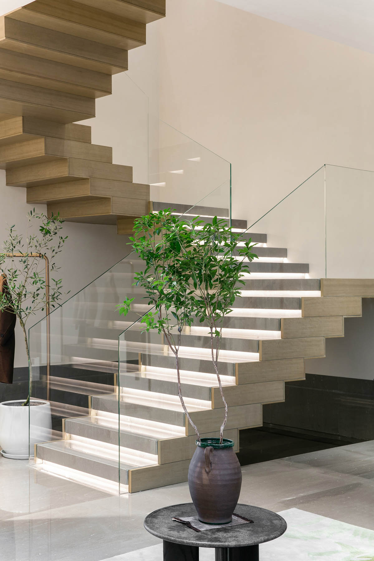 JYDP designs retail space with warm tones and curved walls in Shanghai