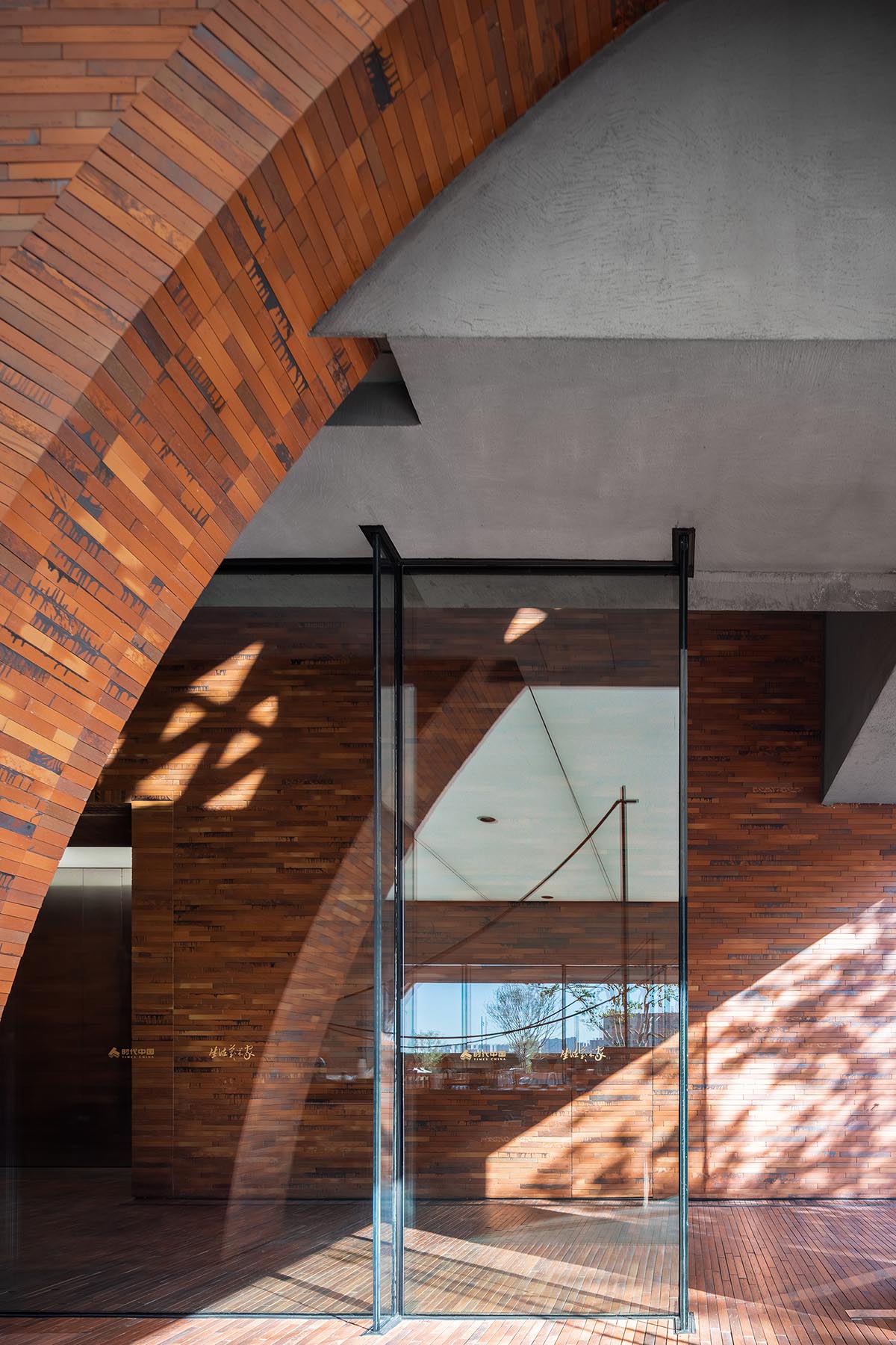 DOMANI completes TIC Art Center with red ceramic brick in Foshan 