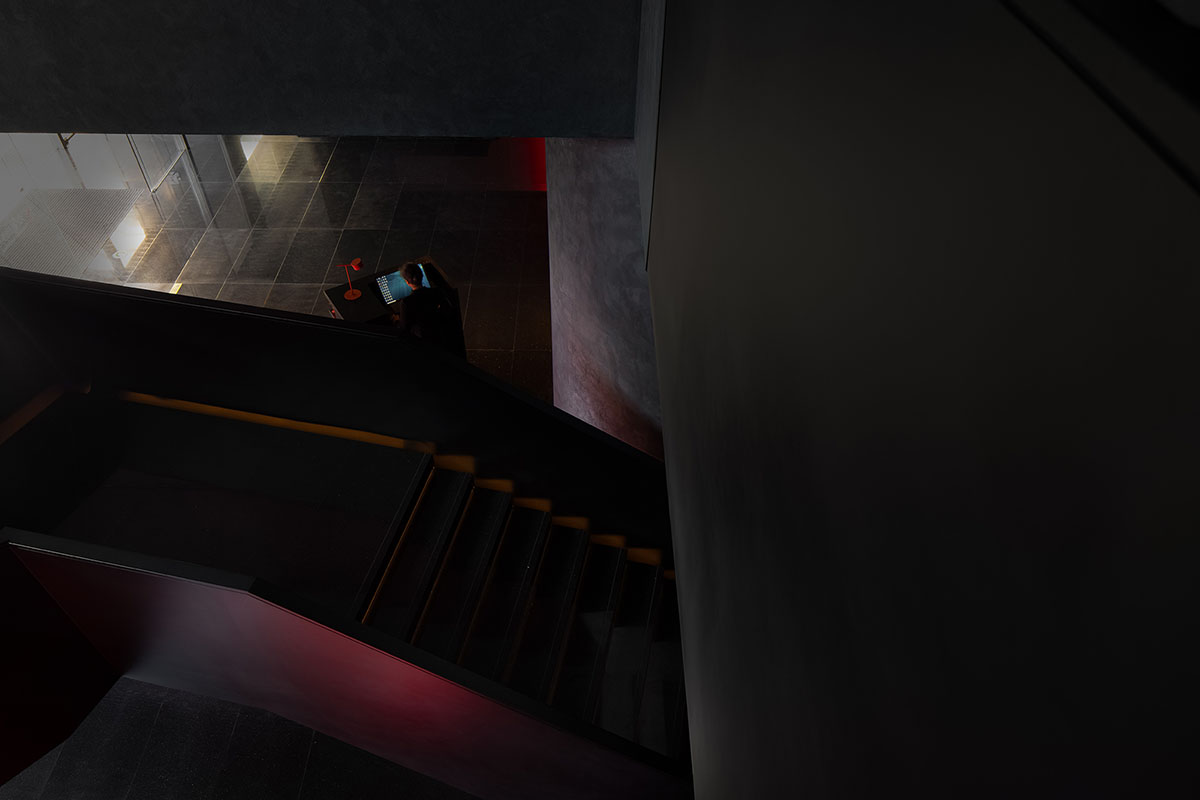 AD ARCHITECTURE designs restaurant in Beijing with black interiors creating a sense of mystery