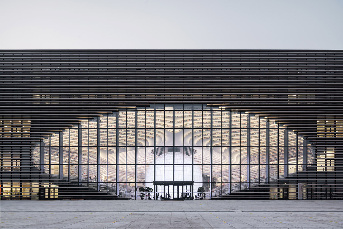 MVRDV’s topographical Tianjin Binhai Public Library featuring millions of books opens in China