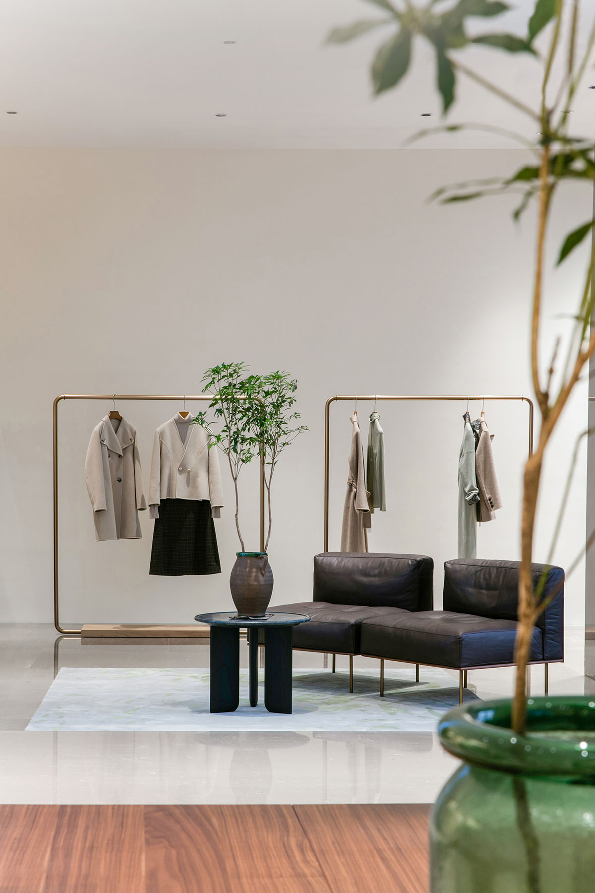 JYDP designs retail space with warm tones and curved walls in Shanghai