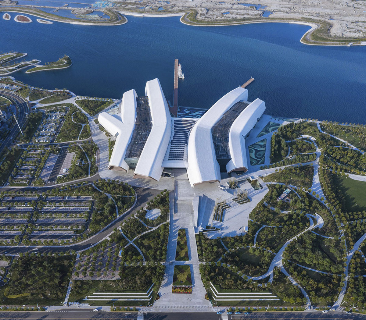 COX Architecture completes China's first National Maritime Museum inspired by aquatic references