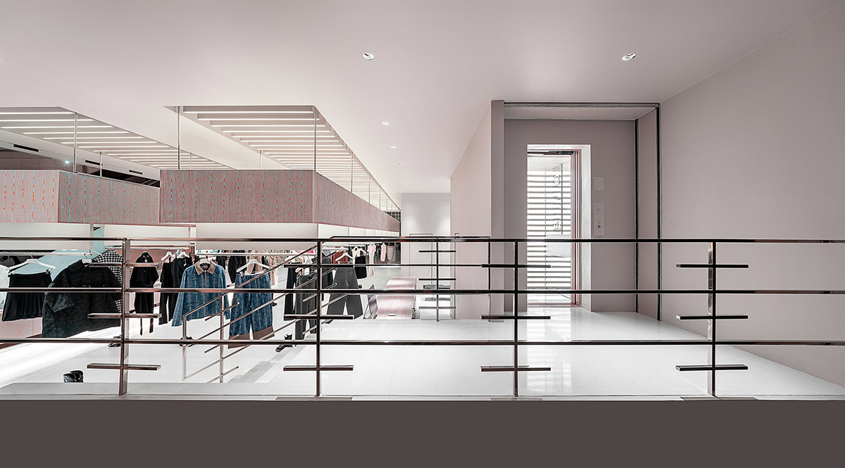 Various Associates creates show-like and pink-hued fashion store under a viaduct in Chongqing