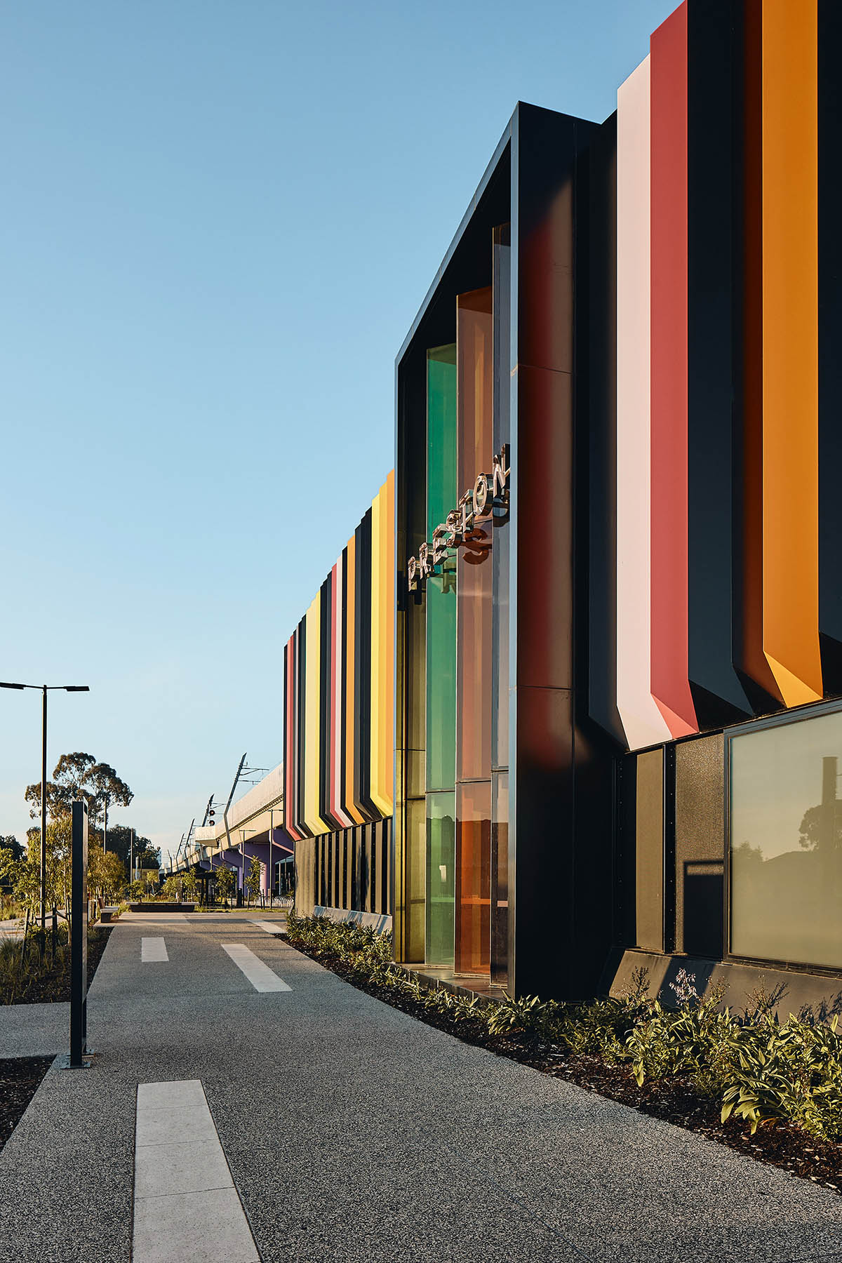 Wood Marsh abstracts Darebin’s roofscape into a 3D concrete pattern for Bell and Preston Stations