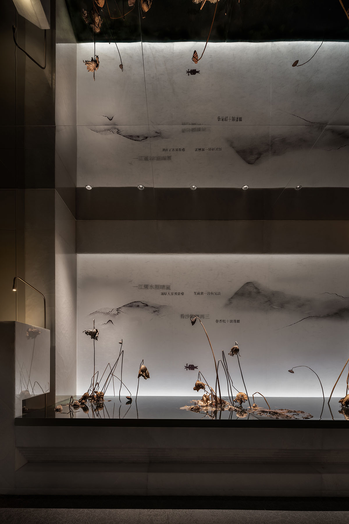 Nature Times Art Design completes restaurant with cave-like wall and garden-themed hall in Hangzhou