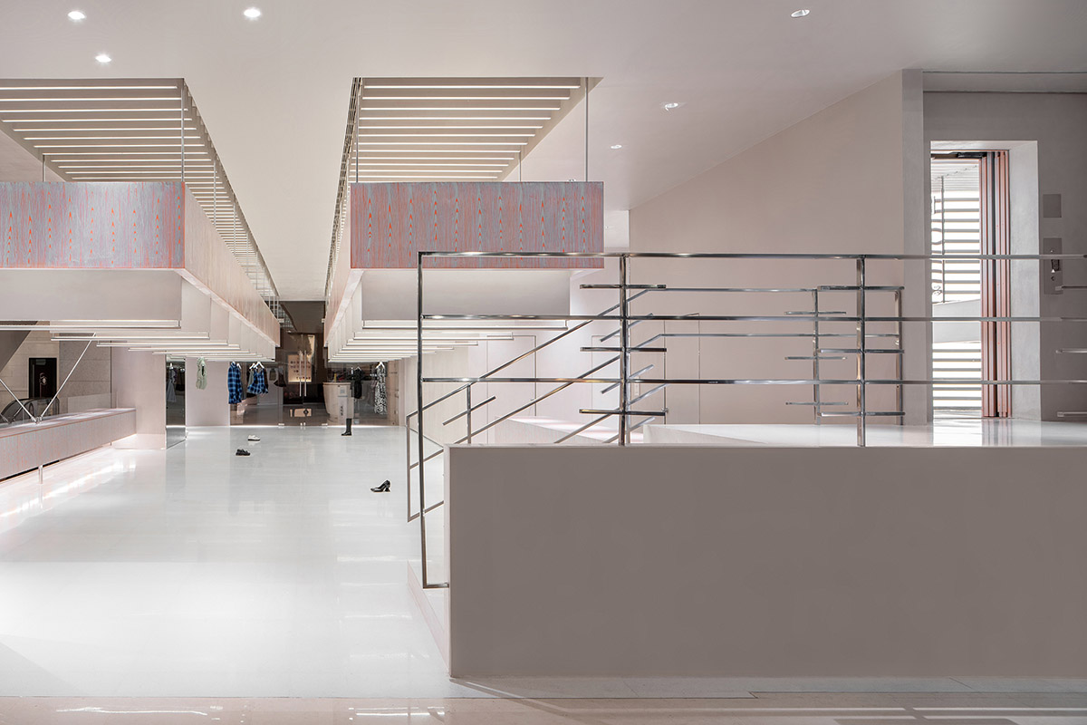 Various Associates creates show-like and pink-hued fashion store under a viaduct in Chongqing
