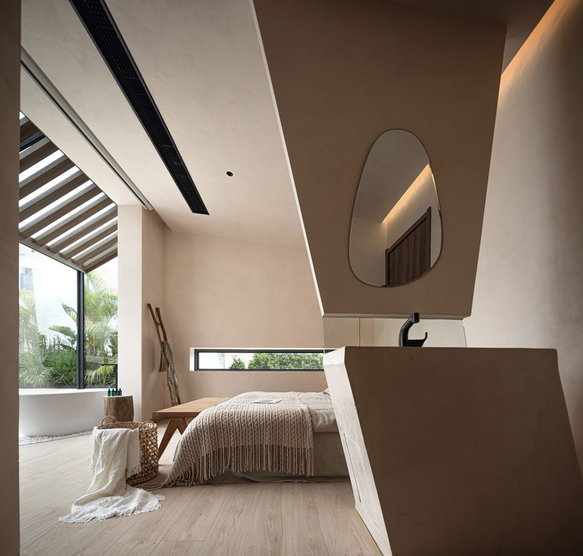 Oblique and hollow walls form this sculpted hotel by AT DESIGN in Southeast of Xiamen
