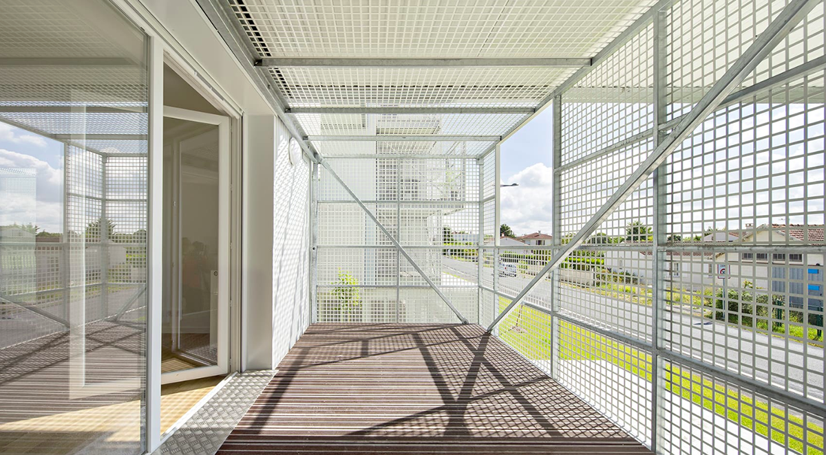 A new social housing project made of stack of metal boxes offers a new way of living  in France