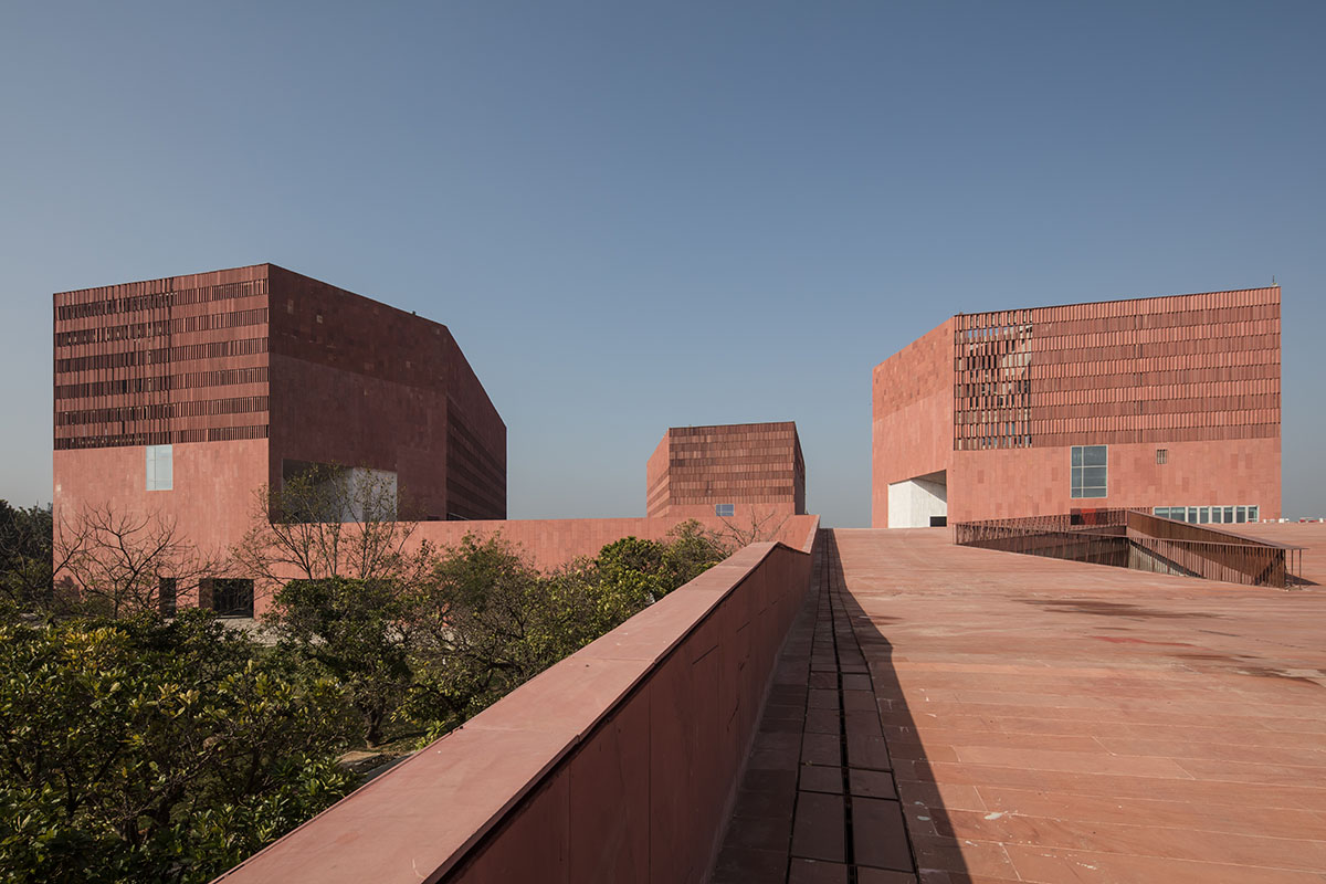 Thapar University Learning Laboratory rises with tall red Agra stone volumes in Punjab, India