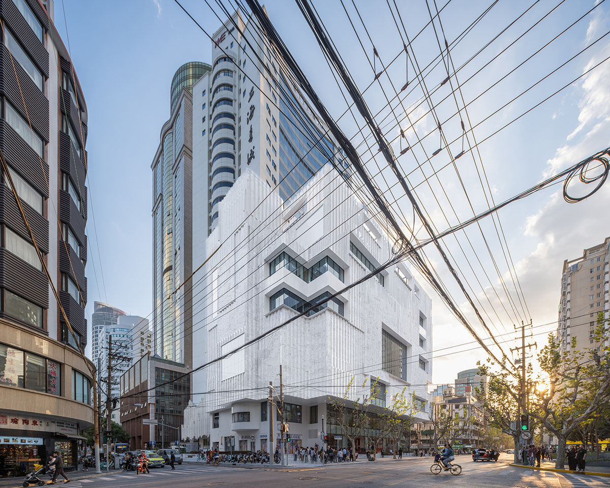 Shanghai Book City by Wutopia Lab clad in perforated metal panels giving a dazzling effect