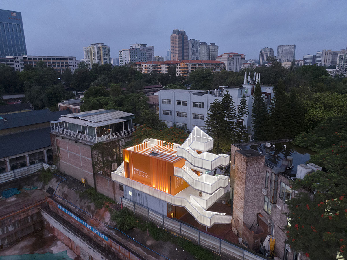 Wutopia Lab completes orange-colored vertical micro social complex with light tower in Guangzhou