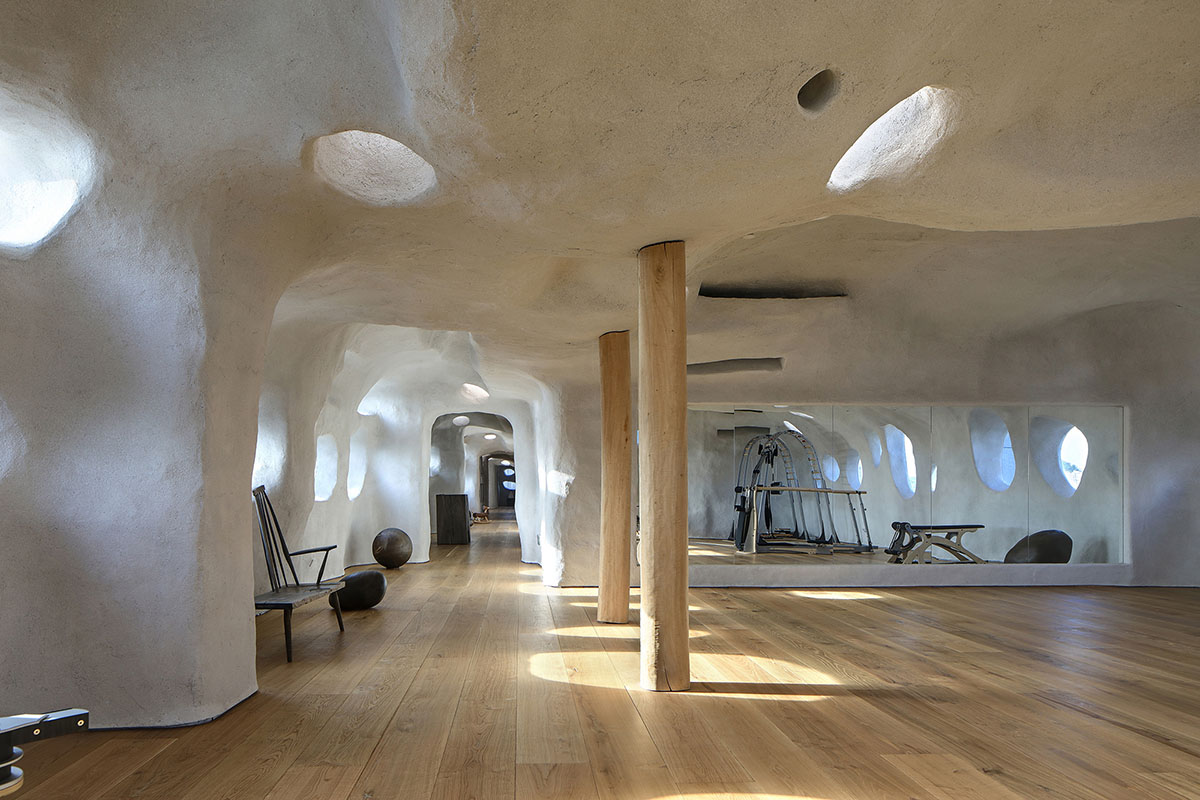 Pilates studio by Wanmu Shazi creates cave-like experience with amorphous interiors in Xiamen