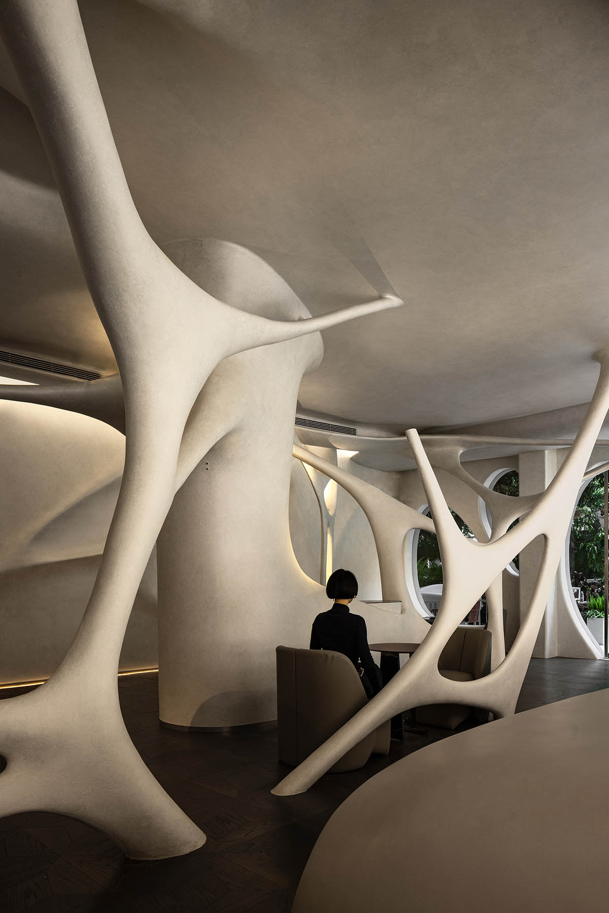 Neuron-like interior by AD ARCHITECTURE combines purity and complexity for cafe and bar in Shenzhen