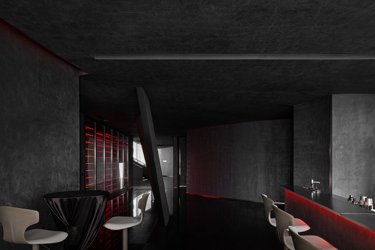 AD ARCHITECTURE designs restaurant in Beijing with black interiors creating a sense of mystery