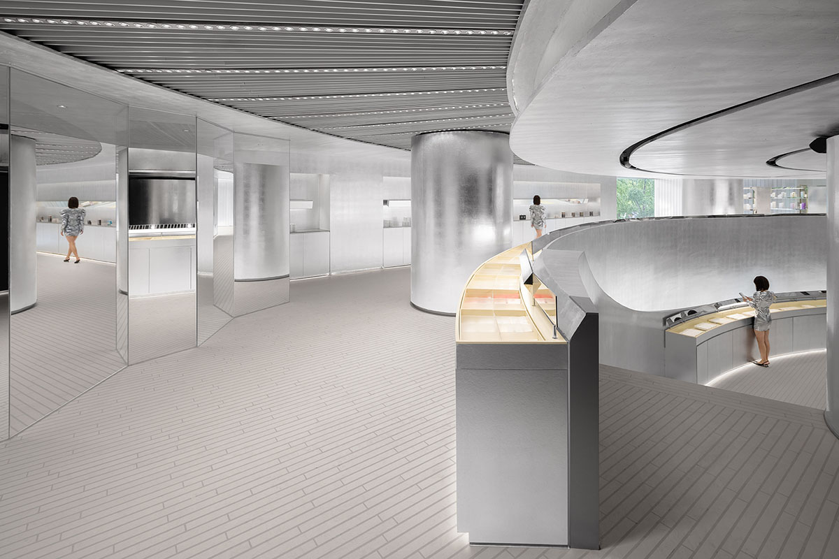 Various Associates designs beauty store with winding staircase and silver-toned interiors in Hangzhou