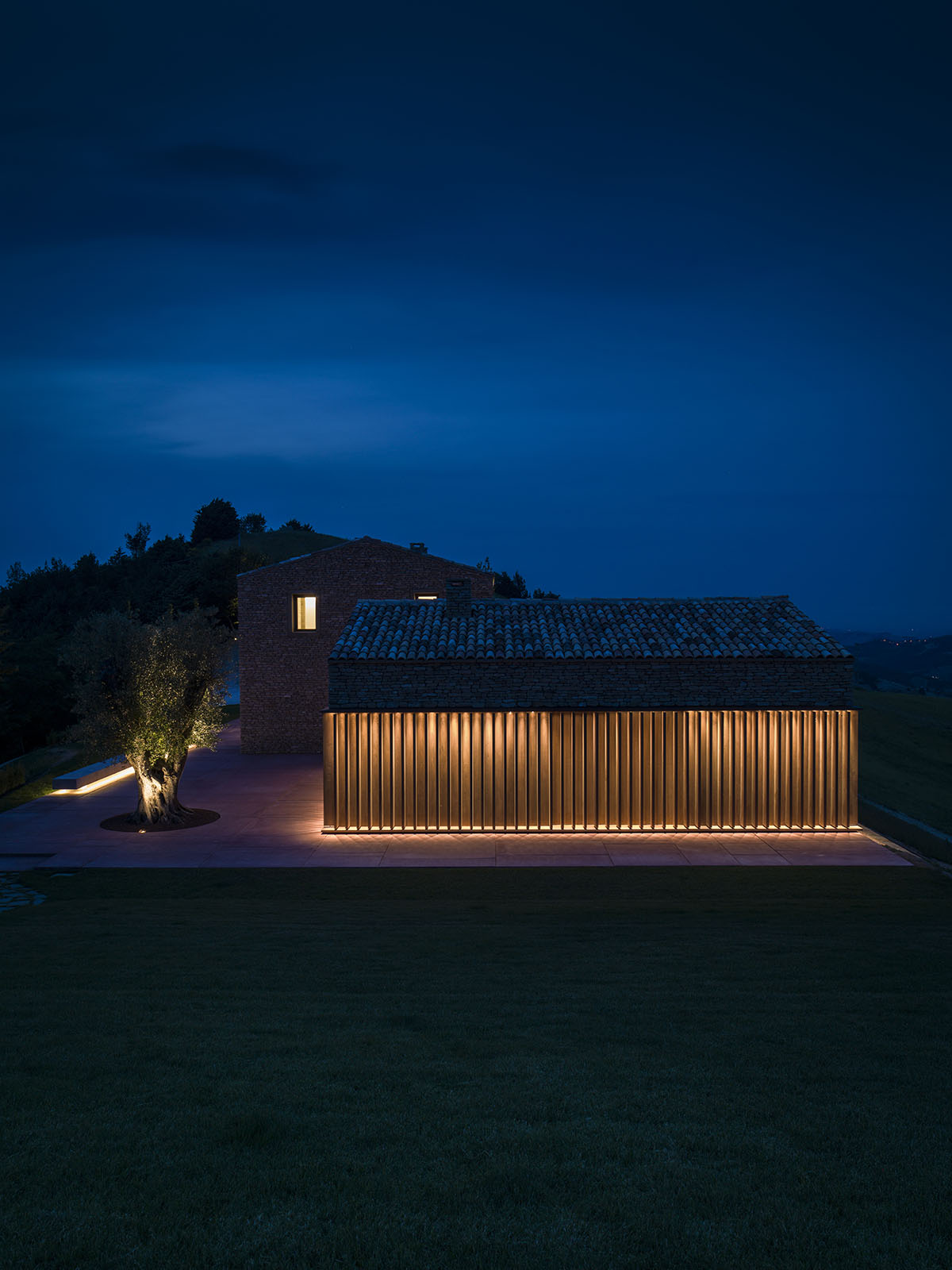 GGA&rsquo;s AP House elegantly harmonised with their stone shell within the historic landscape of Marche