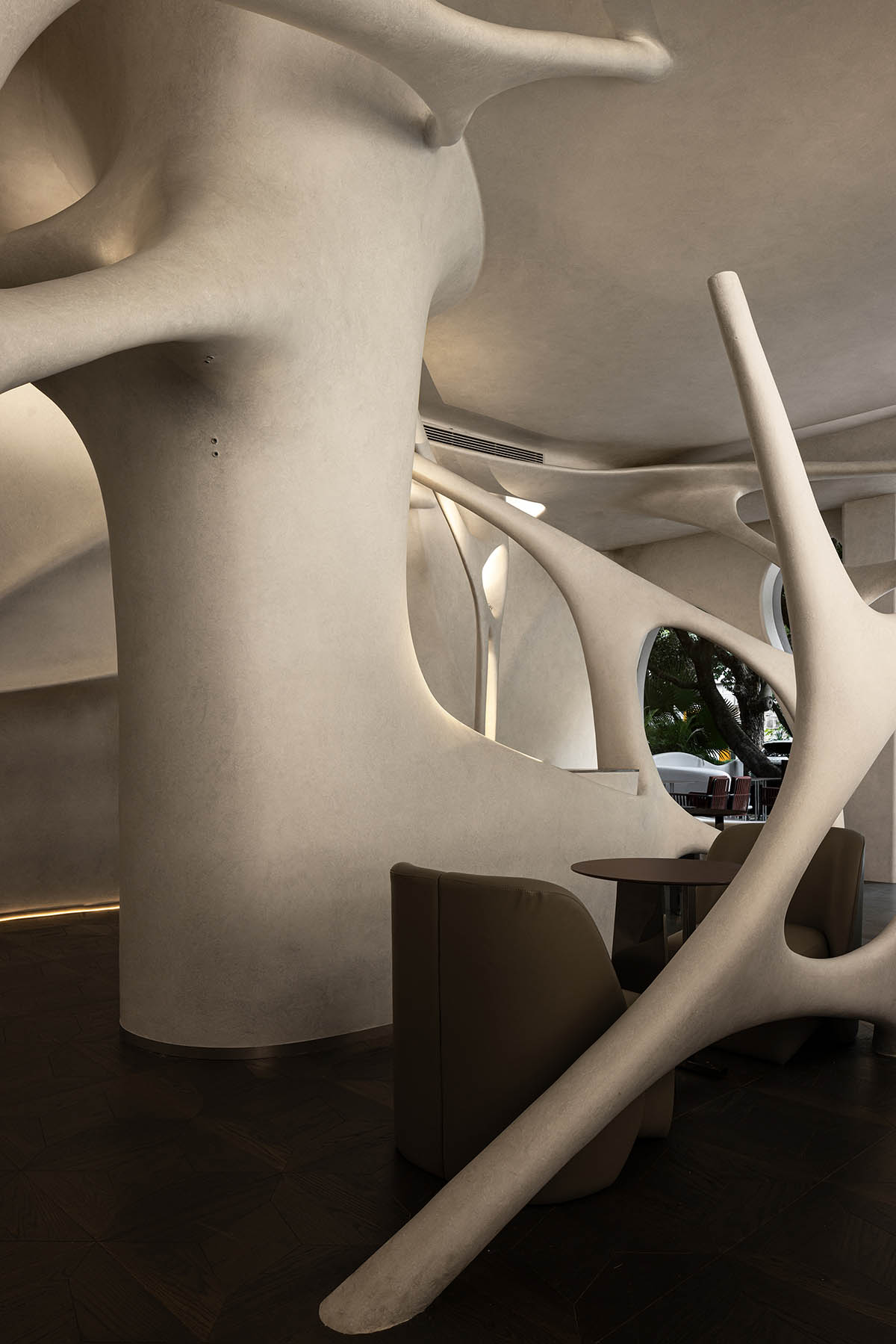 Neuron-like interior by AD ARCHITECTURE combines purity and complexity for cafe and bar in Shenzhen
